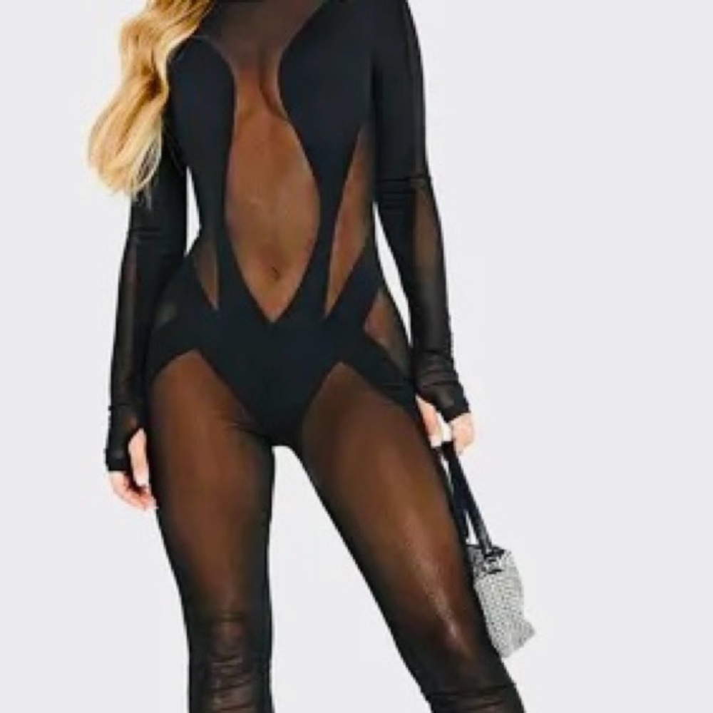 Solado mesh front long sleeve jumpsuit.  Size is XL
